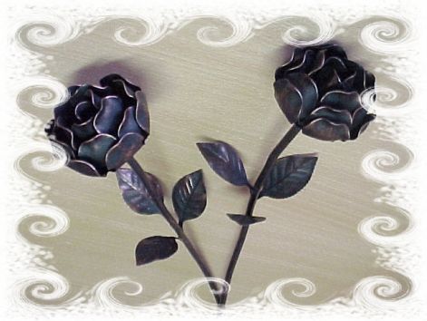 rozsak1.jpg Vascsodák kovácsoltvas kandallórács és ajándéktárgy